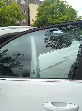 White car with fixed side window Glass